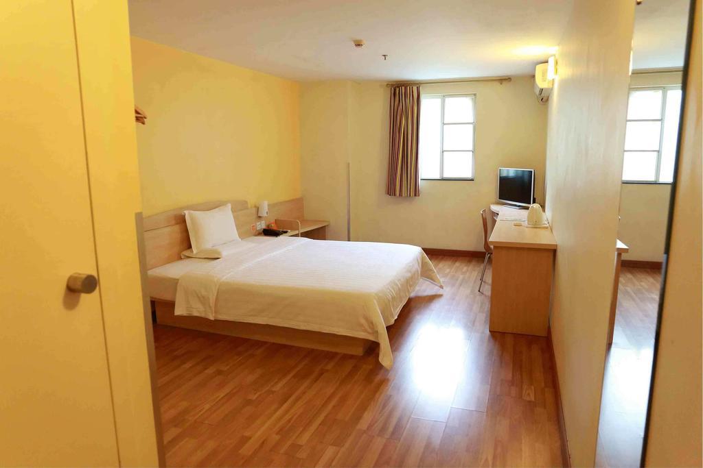 7Days Inn Luoyang Longmen Avenue Normal College Habitación foto